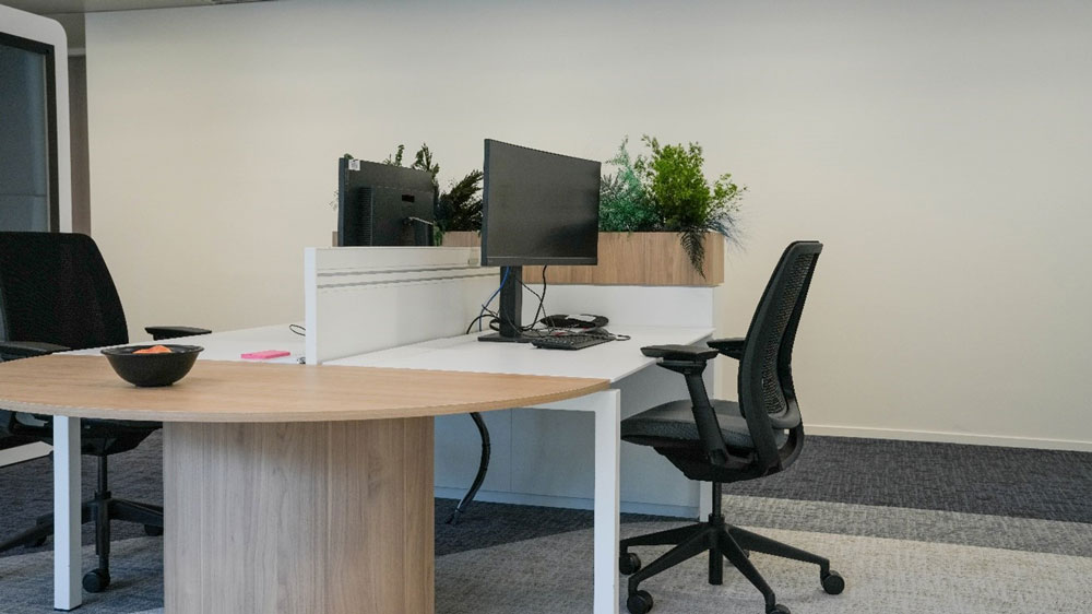 Open space office with desk and chair