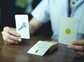A nurse holds up memory cards