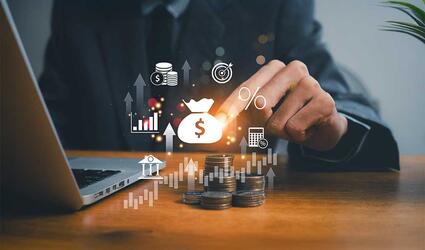 Businessman is calculating income and return on investment in percentage